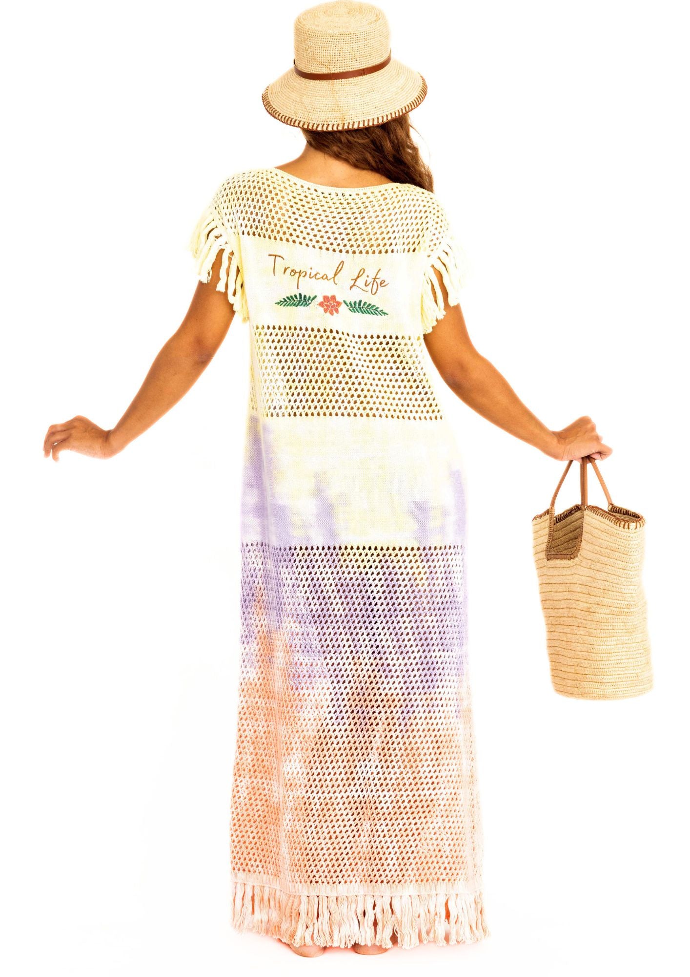 Handcrocheted highend holiday dress in pastel rainbow tiedye with fringes and tropical life text on the back