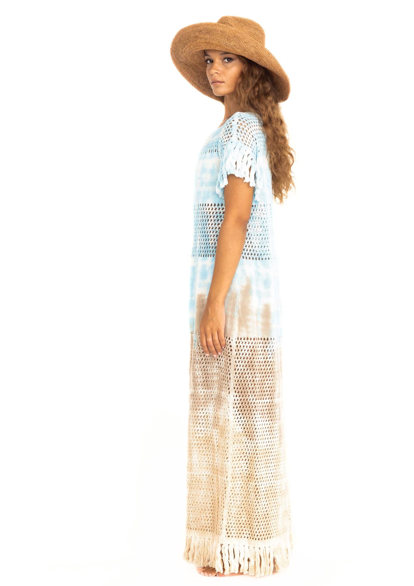 Handcrocheted mesh highend holiday dress in light blue and sand tiedye with fringes