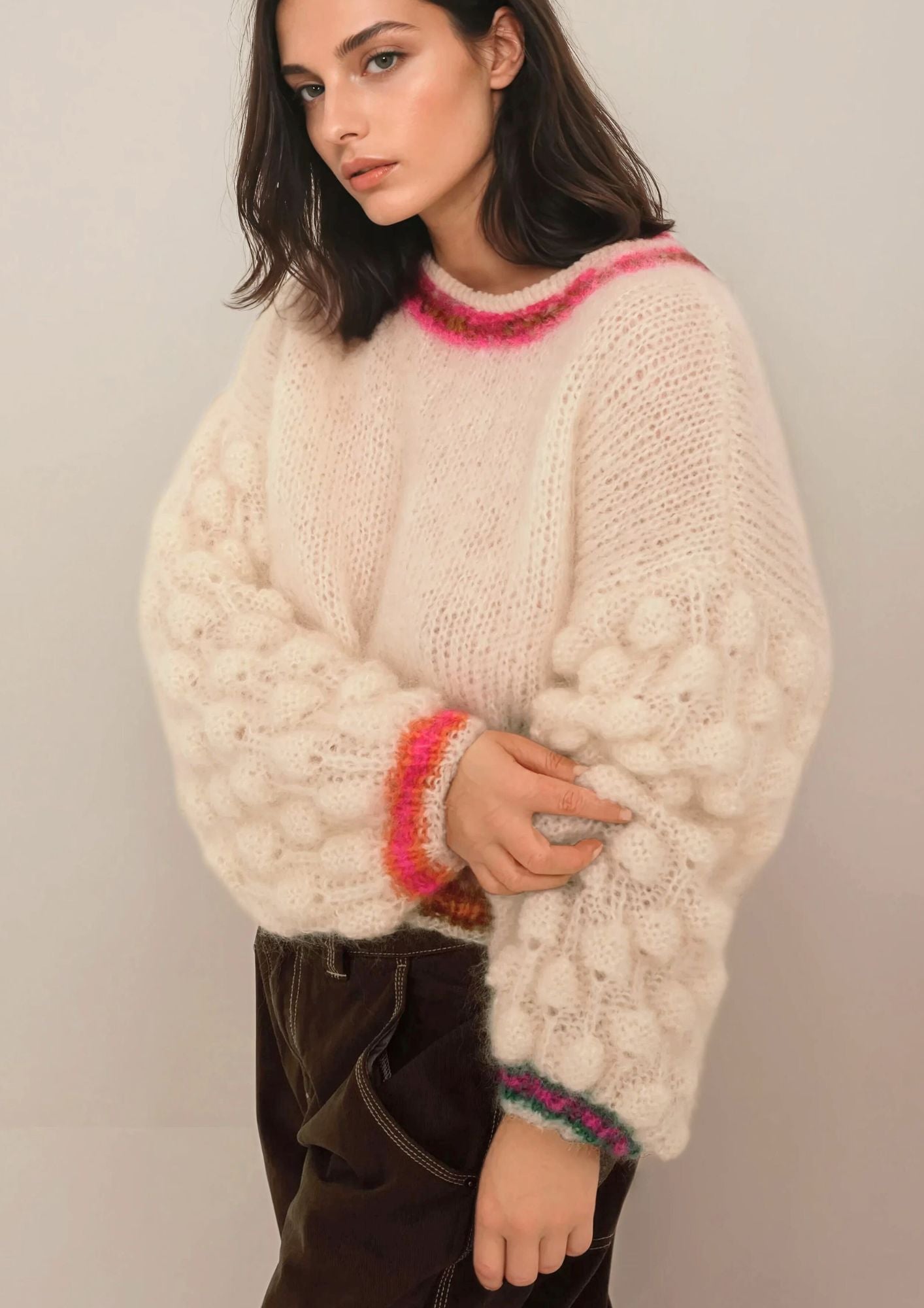 Handknitted sweater in white mohair with colored cuffs and borders
