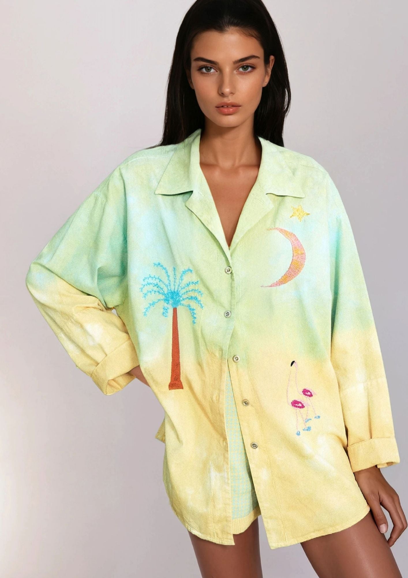 Girl in a tiedye shirt with embroideries