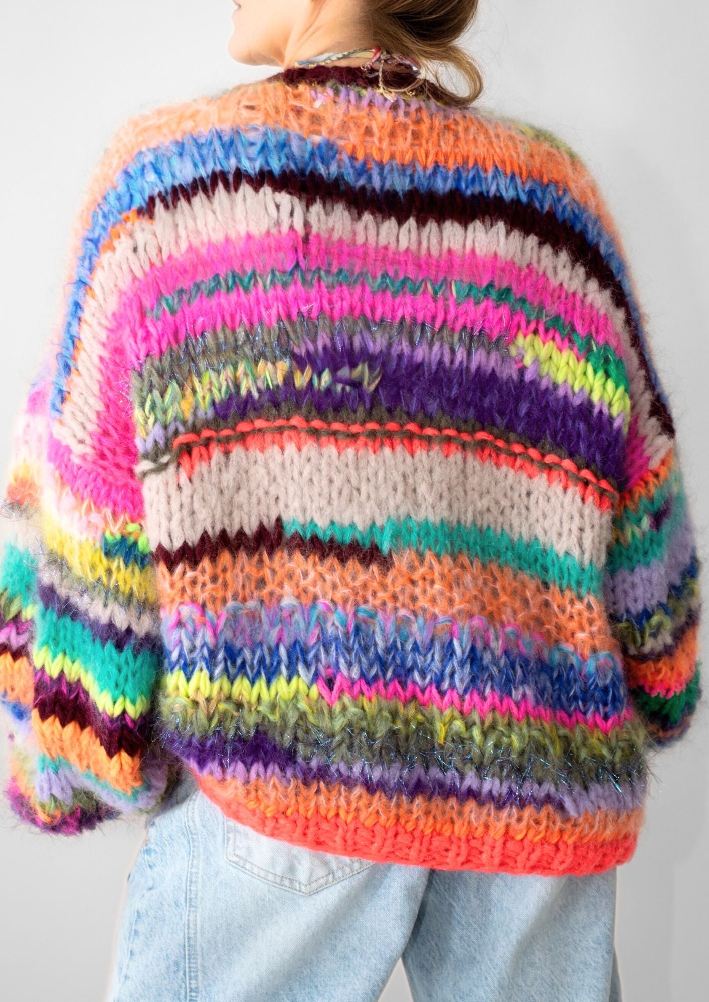 back of a colorful striped handmade jacket