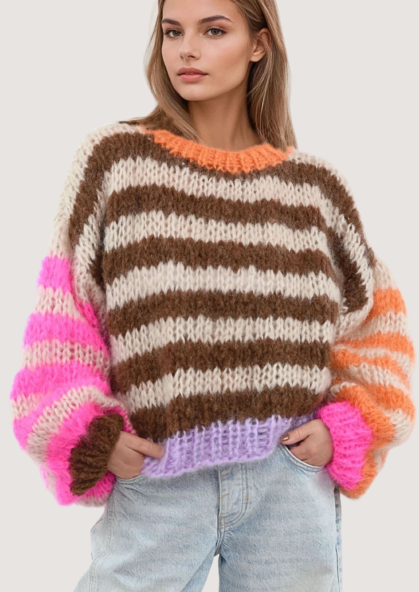Handknitted multi color luxury cardigan by Kitty van Coesant