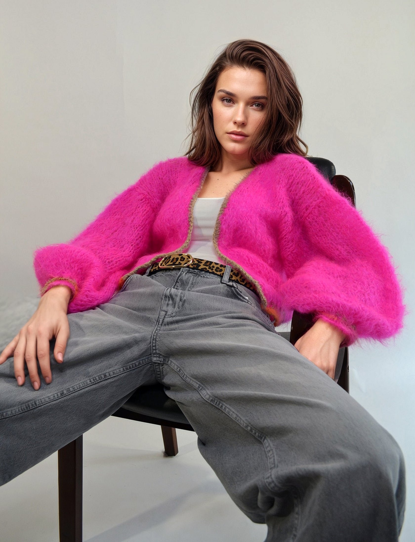 cool girl in Girl in a jeans and a handknitted hotpink jacket