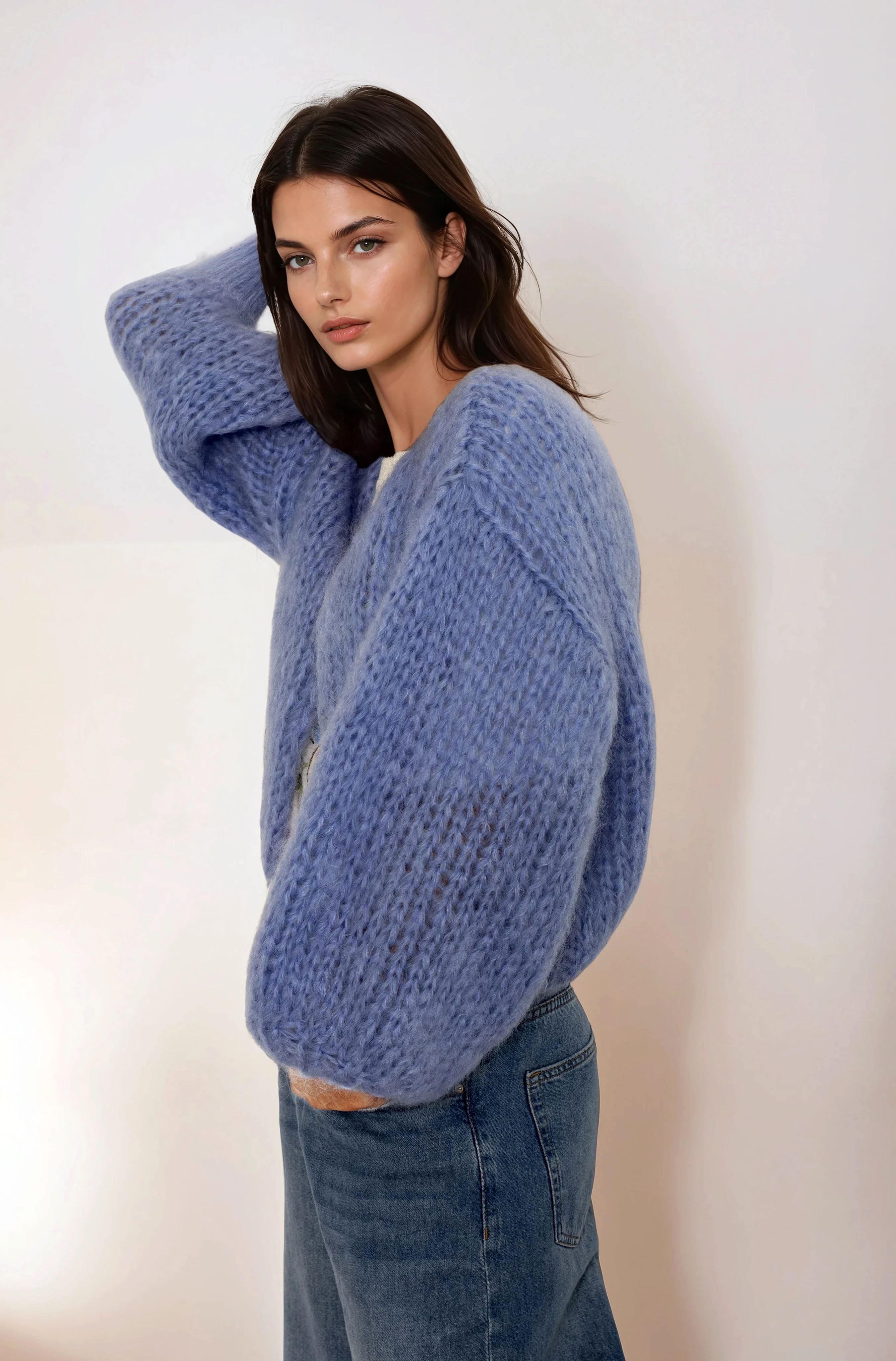 Woman in a blue mohair jacket and jeans