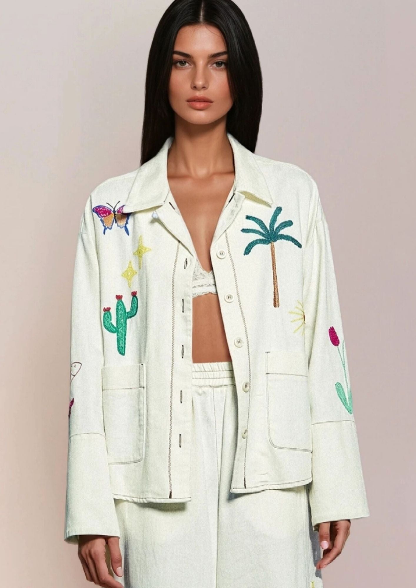 Girl in white jacket with butterfly cactus and Palmtree embroideries