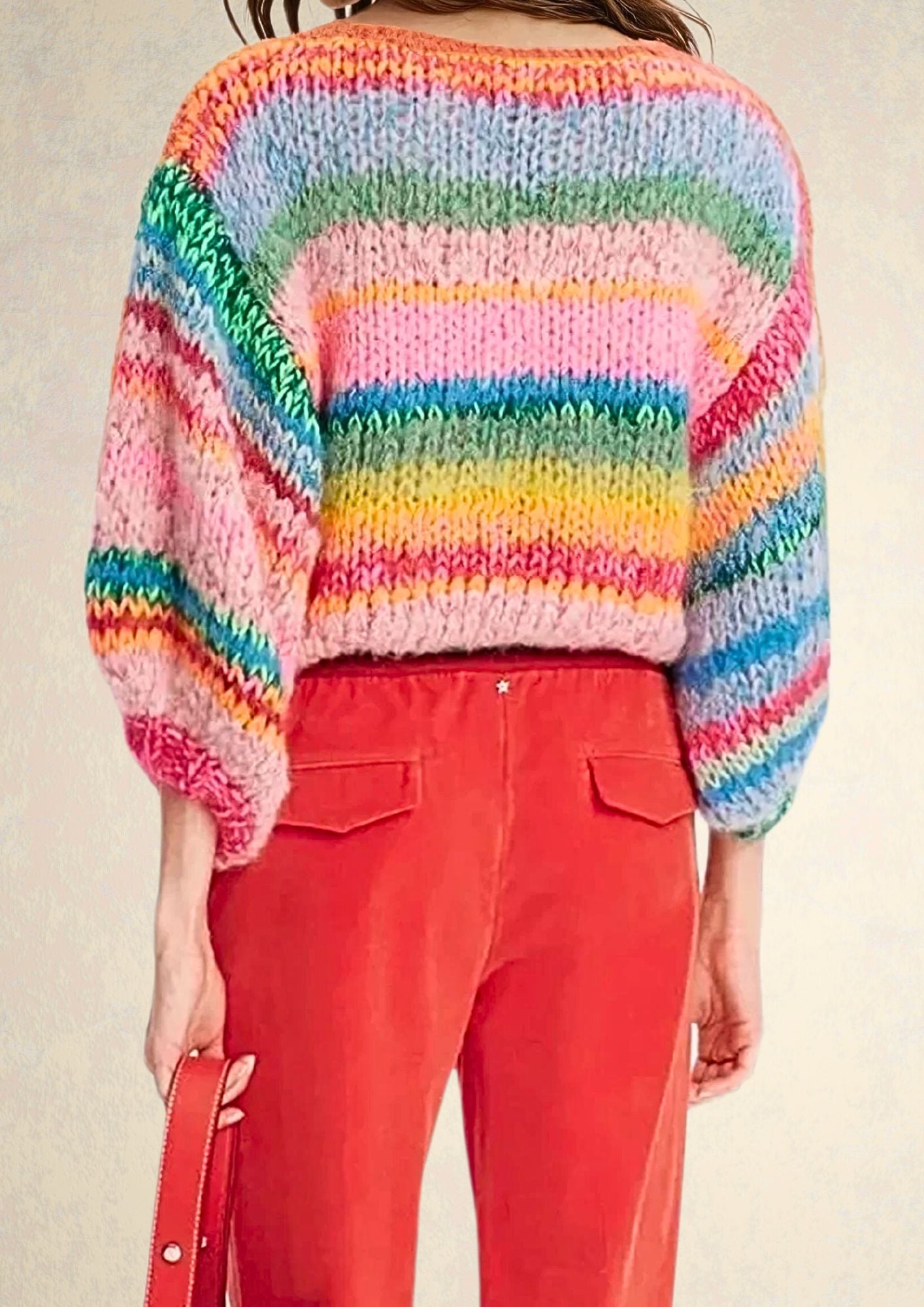 back of a handknitted colorful sweater